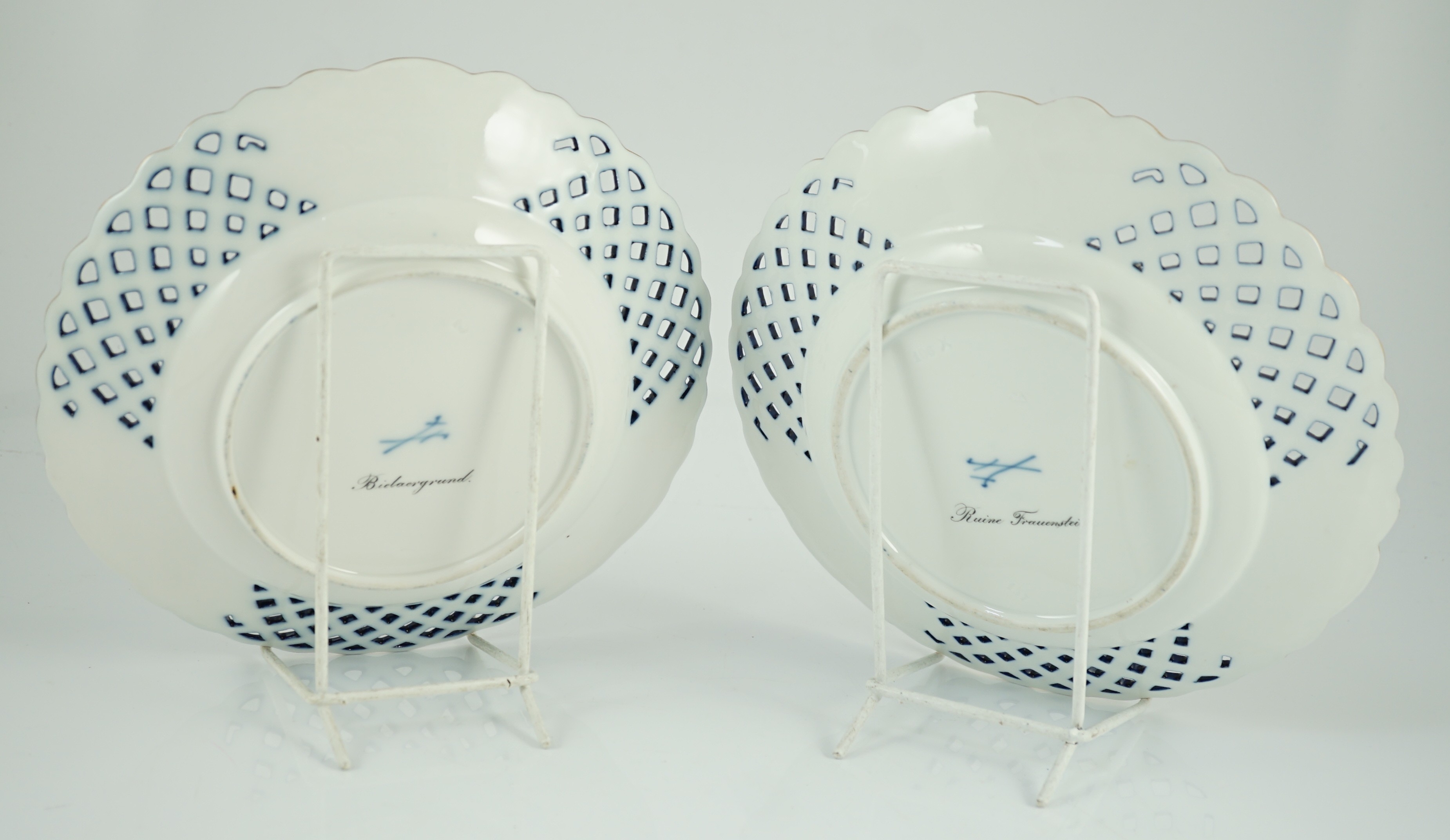 A pair of Meissen reticulated named view plates, 19th century, 23.7cm diameter